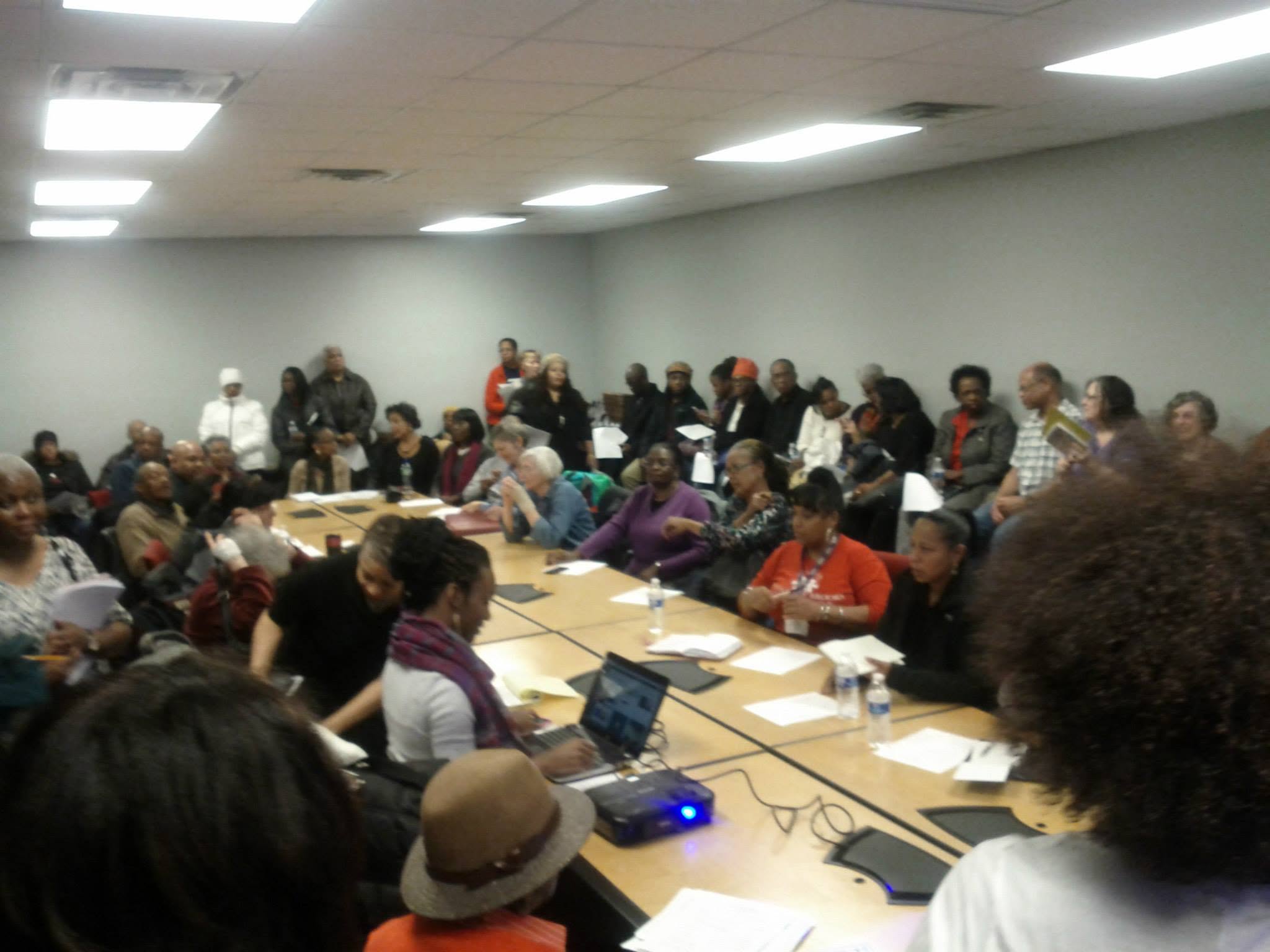 South Shore residents gathered around tables and along the walls at the Planning Coalition’s grocery-store town hall